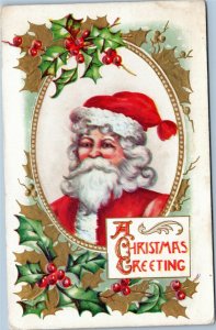 Santa in oval frame with holly - A Christmas Greeting - vintage postcard
