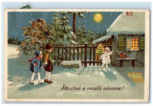 1941 Christmas Tree Candle Lights Holding Angel Winter Scene Germany Postcard