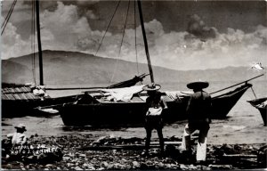 RPPC Postcard Mexico Jalisco Chapala Jal Man & Woman by Fishing Boat 1940s S115