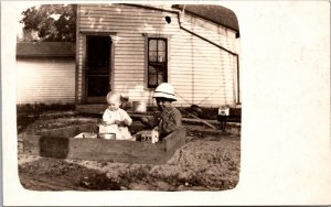 Real Photo Postcard Two Children Playing in a Sandbox