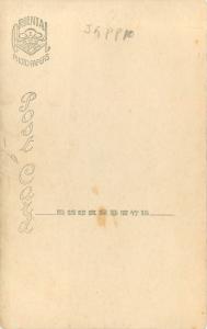 Vintage RPPC Postcard Japanese Geisha Girl Choosing Fabric Traditional Interior