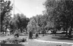 Emerson Iowa~City Park~Memorial in Center~Playground~Man Gardening~1961 RPPC