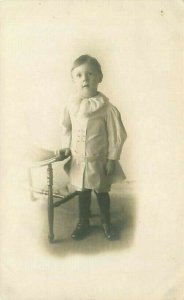 Early 1900s Child Studio Photo RPPC WL Millner Sporting Goods Dept Toledo OH