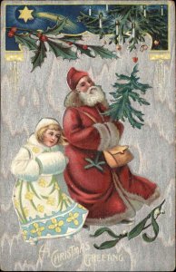 Christmas Santa Claus Fancy Girl Muff Holly Embossed c1900s-20s Postcard