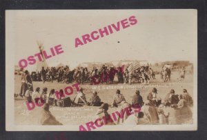 McLaughlin SOUTH DAKOTA RPPC c1915 SIOUX INDIANS Indian WAR DANCE Circle FLAG SD