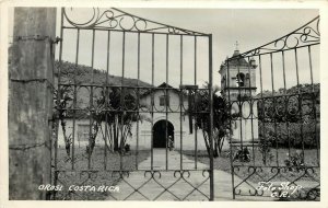 RPPC Postcard Wrought Iron Gate Catholic Church Orosi, Costa Rica Latin America