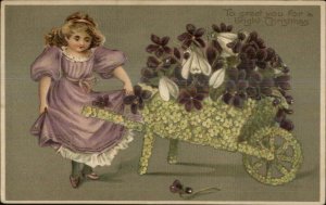 Christmas - Pretty Little Girl Floral Wheelbarrow c1910 Postcard
