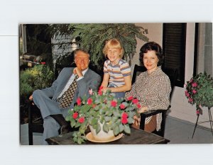 Postcard Jimmy, Rosalynn and daughter Amy on Mother Allie's porch, Plains, GA