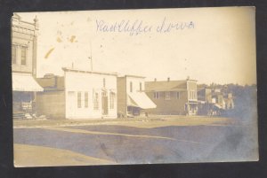 RPPC RADCLIFFE IOWA DOWNTOWN STREET SCENE DIRT STORES 1907REAL PHOTO POSTCARD