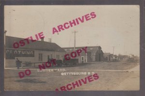 Gettysburg SOUTH DAKOTA RPPC 1910 LUMBER YARD Main Street nr Mobridge Hoven SD