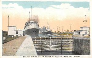 Sault Ste Marie Ontario Canada steamers in Lock waiting antique pc Z50970