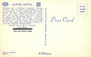 Gaylord Michigan~Alpine Motel~US & Canadian Flags~1960s Postcard