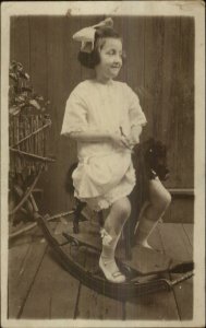 Little Girl on Toy Rocking Horse c1910 Real Photo Postcard