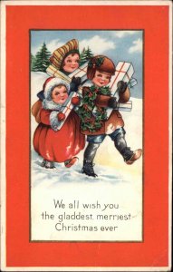 Whitney Christmas Children in Snow with Presents Gifts Vintage Postcard