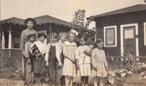 RPPC Postcard Group Children holding Mini Pinscher Dog + Cat c. 1920s