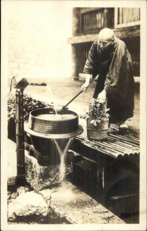 Chinese Man at Water Pump - Monk? c1910 Real Photo Postcard myn