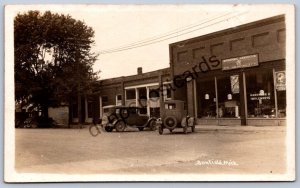 K51/ Sunfield Michigan RPPC Postcard c1930 Hardware Store Automobiles 172