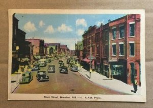VINTAGE 1943 USED POSTCARD  MAIN STREET, MONCTON, NEW BRUNSWICK, CANADA CREASED