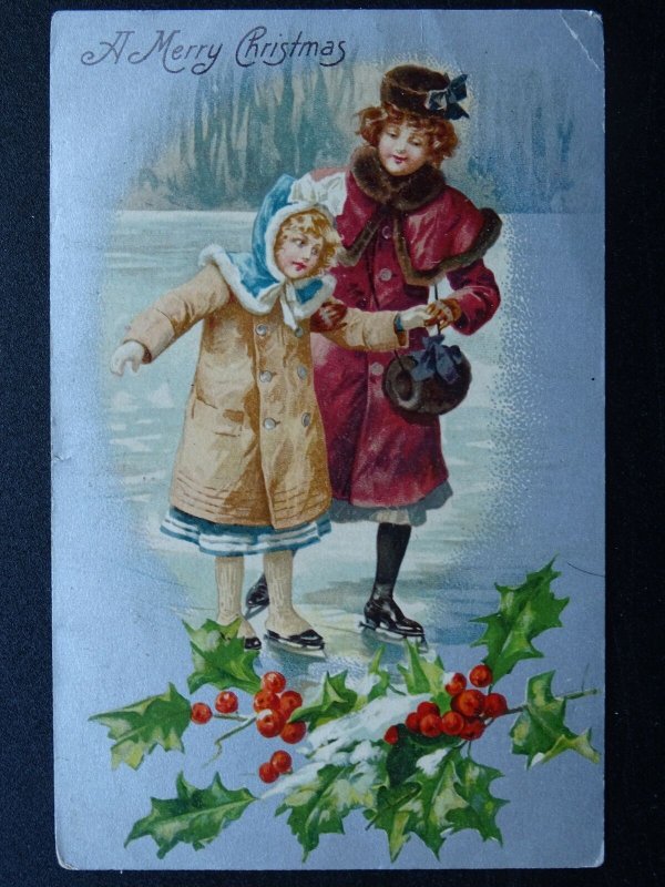 A MERRY CHRISTMAS Children Ice Skating c1902 UB Postcard