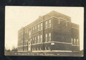 RPPC STEELE CITY NEBRASKA HIGH SCHOOL ARMING ADVERTISING REAL PHOTO POSTCARD