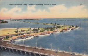 Florida Miami Yachts Anchored Along County Causeway