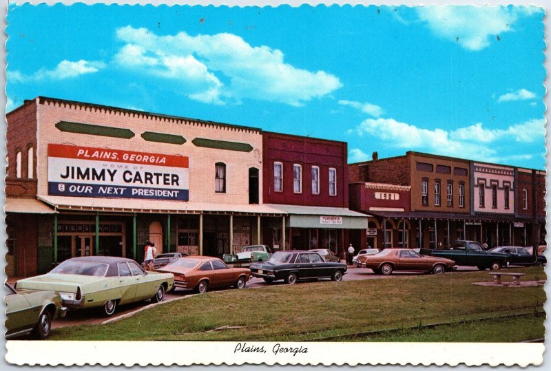 VINTAGE CONTINENTAL SIZE POSTCARD STREET SCENE AT PLAINS GEORGIA CARTER CENTER