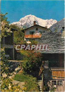 Postcard Modern Courmayeur rustic cabins in the valley in the background the ...