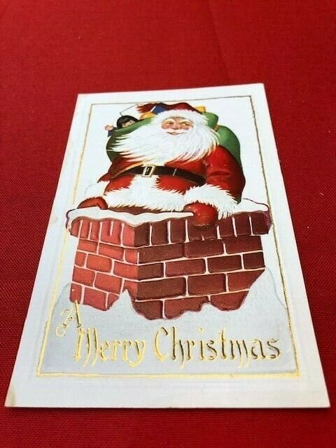 embossed postcard SANTA on chimney, China Doll In Toy Sack A Merry Christmas 