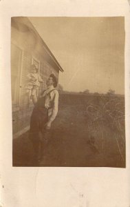 Interesting Real Photo,RPPC,Farmer Holding Child Up w/one hand, MSG,Old Postcard