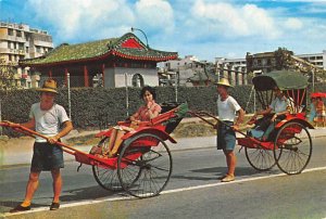 Pleasure rides on Richshaws in Jordan Road Kowloon Hong Kong 1982 