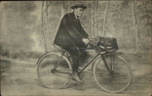 French Man Riding Bicycle w/ Leather Bag c1910 Postcard