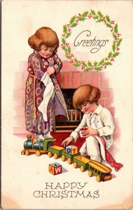 Christmas Postcard Boy and Girl Playing with Train and Blocks, Stockings~3932