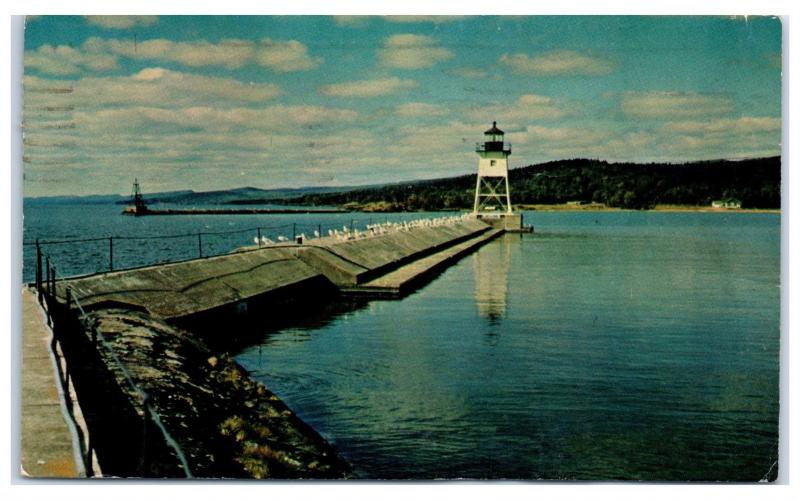 1967 Breakwater and Lighthouse at Grand Marais, MN Postcard