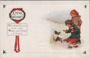 Postcard Christmas Children Feeding Squirrels in Snow