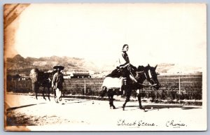 K45/ China Foreign RPPC Postcard c1910 Street Scene China Horse People 275