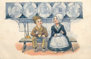 Embossed 1906 drawn Dutch lovely boy & girl couple costumes & tea Delft chromo