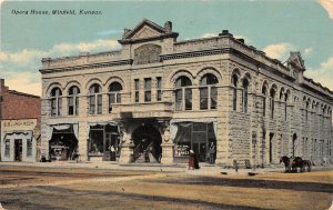 G4/ Winfield Kansas Postcard 1912 Opera House Meat Market Store
