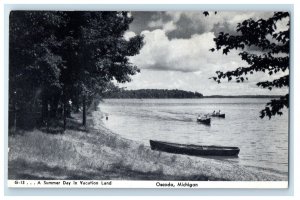 c1910 Canoe Boat, A Summer Day in Vacation Land Oscoda Michigan MI Postcard