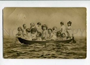 3028358 MULTIPLE BABIES in Boat. Vintage PHOTO