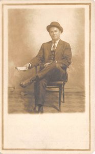 Kansas City Missouri 1910s RPPC Real Photo Postcard Man Holding Newspaper