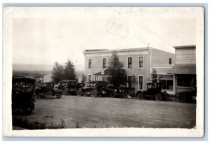 Encampment Wyoming WY Postcard RPPC Photo Hotel Inn Building Cars Scene c1910's