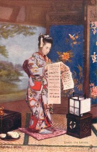 Japan culture & ethnicity Japanese beauty Asian girl reading a letter postcard