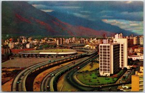 El Pulpo Caracas Venezuela Aerial View Roadways Buildings & Mountains Postcard