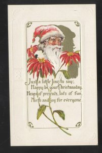 VINTAGE EMBOSSED SANTA CLAUS POSTCARD POINSETTIA FREMONT COLORADO POSTCARD