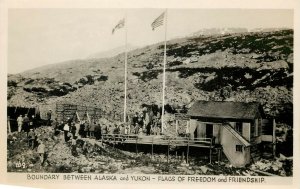 RPPC Postcard Boundary Between Alaska & Yukon Flags of Freedom & Friendship 109