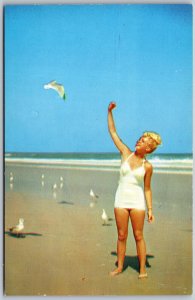 Vtg Shapely Mermaid Feeding a Sea-Gull Woman Bathing in Suit Beach View Postcard