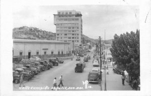 Mexico Nogales Calle Campillo automobiles Trucks RPPC Photo Postcard 22-5086