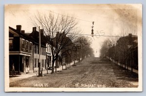 J87/ Mount Pleasant Ohio RPPC Postcard c1910 Steubenville Onion St Stores 1899