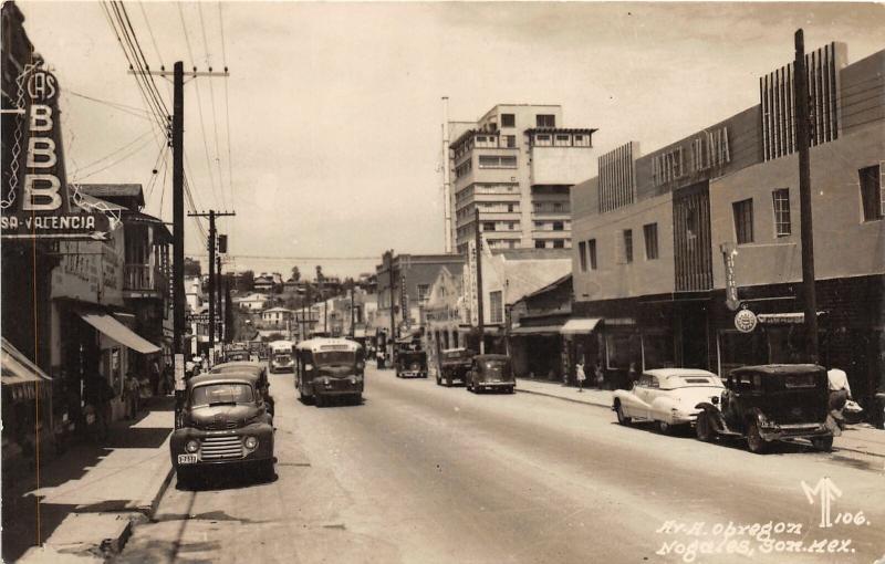 F61/ Foreign RPPC Postcard Mexico Nogales 1953 Av H. Obregon Stores