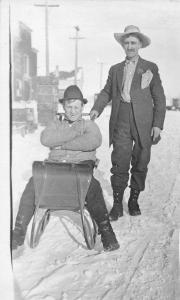 F37/ Interesting Real Photo RPPC Postcard c1910 Men Street Winter Sled Snow